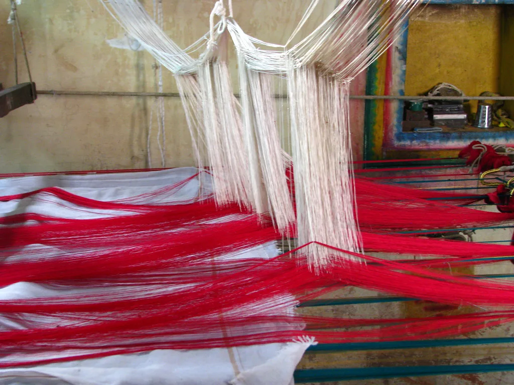 At the loom in the field — where a lineage is kept and recorded